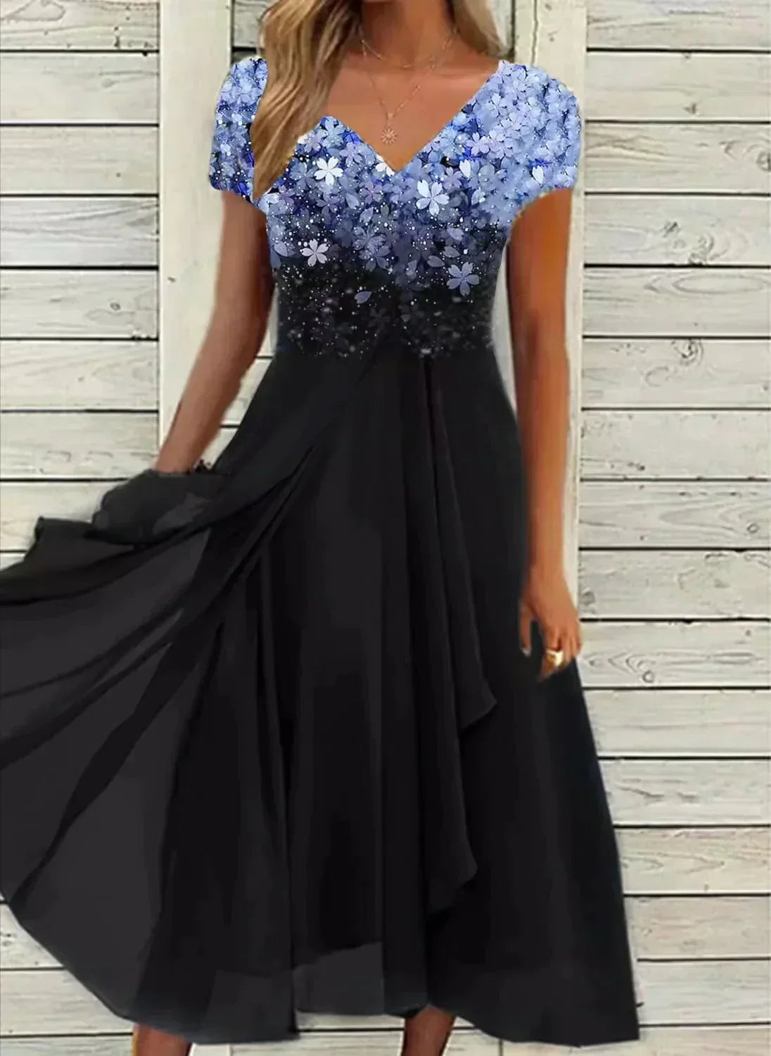 Women's floral V-neck maxi dress with short sleeves and flared skirt