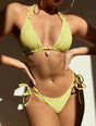 Women's textured triangle bikini set with halter ties, side-tie bottoms and beaded details