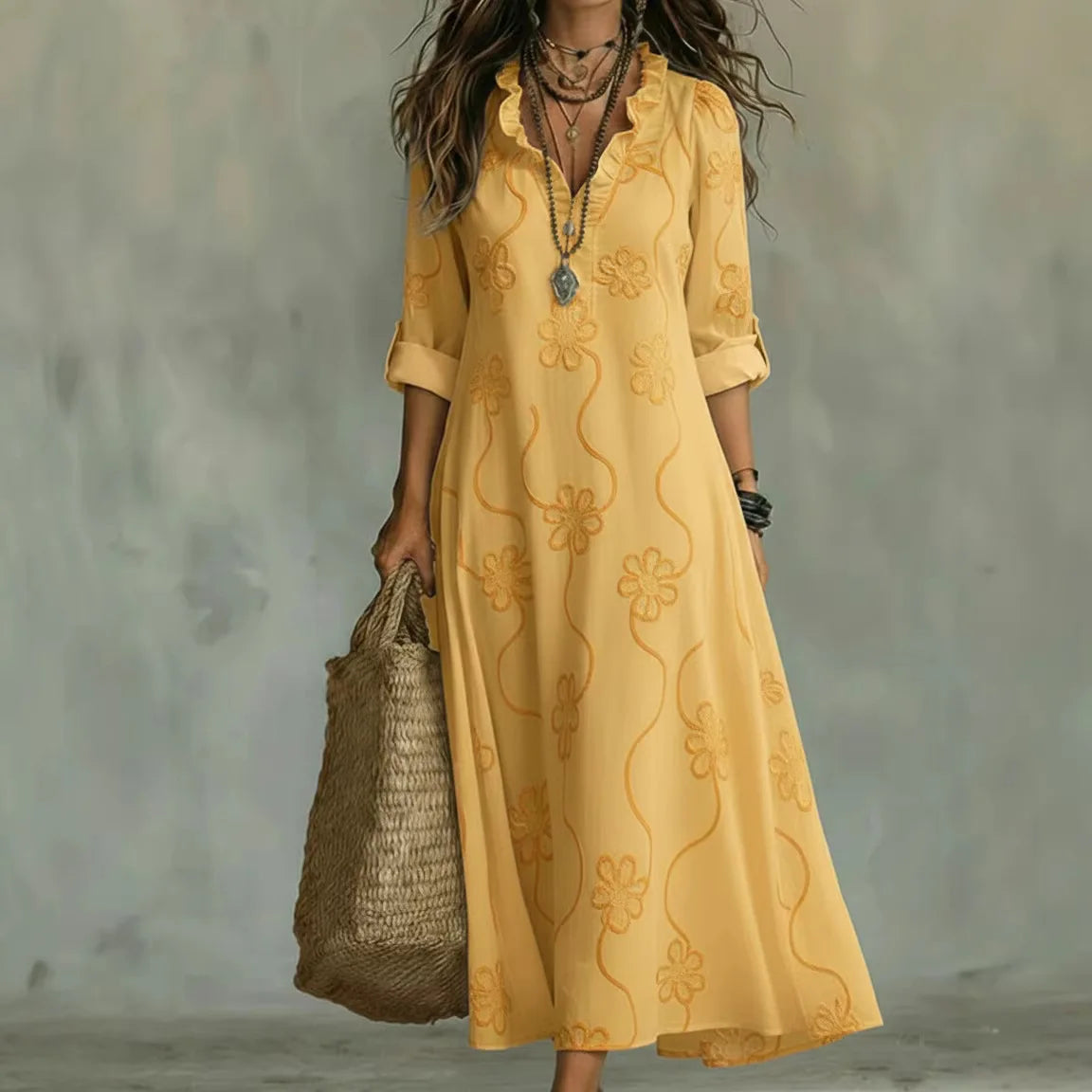 Women's floral maxi dress with V-neckline and three-quarter sleeves