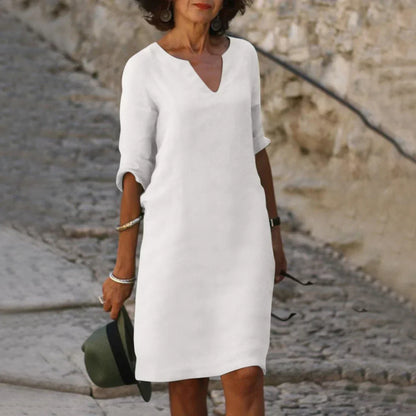 Women's straight mini dress with V-neckline and three-quarter sleeves