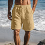 Men's knee-length swim shorts with elasticated drawstring waist and side pockets