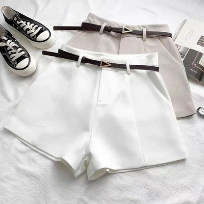Women's high-waisted tailored shorts with a belt and triangular buckle