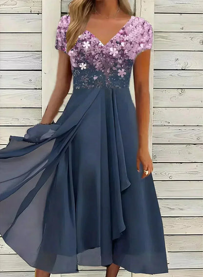 Women's floral V-neck maxi dress with short sleeves and flared skirt