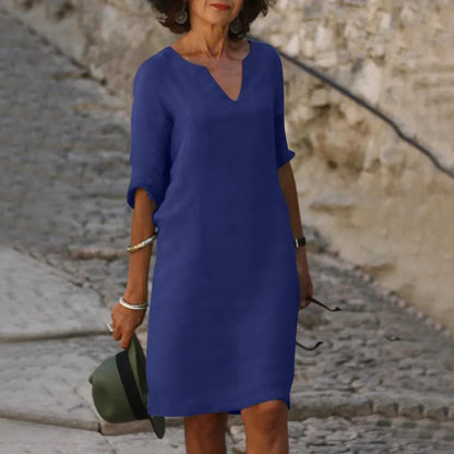 Women's straight mini dress with V-neckline and three-quarter sleeves