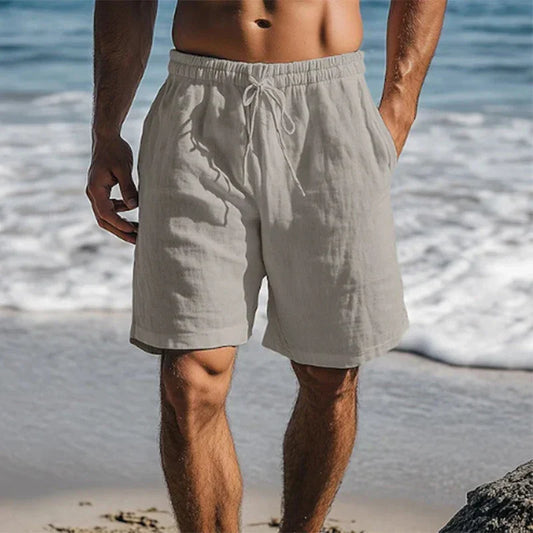 Men's knee-length swim shorts with elasticated drawstring waist and side pockets