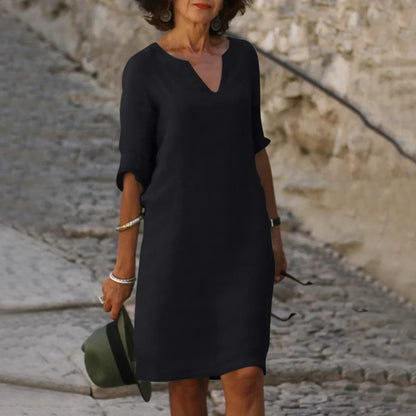 Women's straight mini dress with V-neckline and three-quarter sleeves