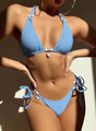 Women's textured triangle bikini set with halter ties, side-tie bottoms and beaded details