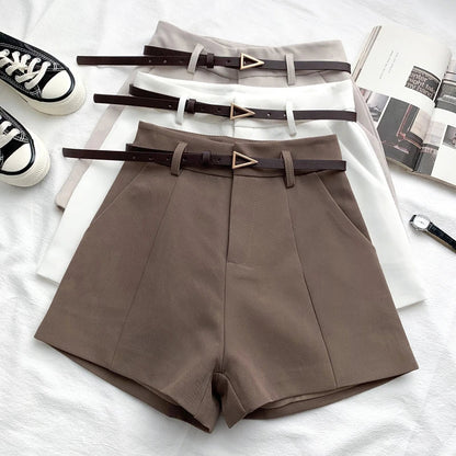 Women's high-waisted tailored shorts with a belt and triangular buckle