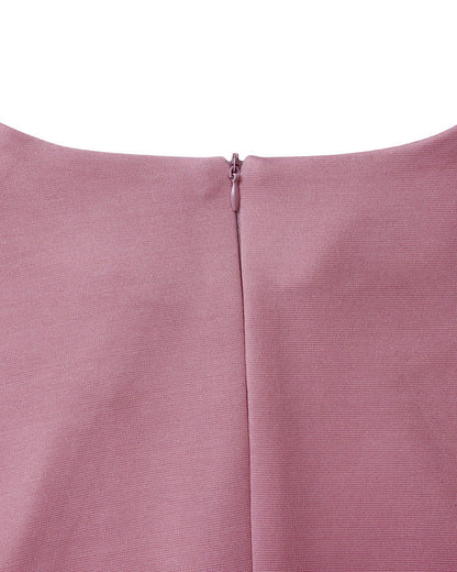 Women's fitted midi pencil dress with long sleeves, round neckline and sculptural waist details