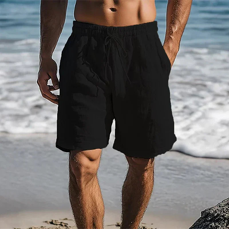 Men's knee-length swim shorts with elasticated drawstring waist and side pockets