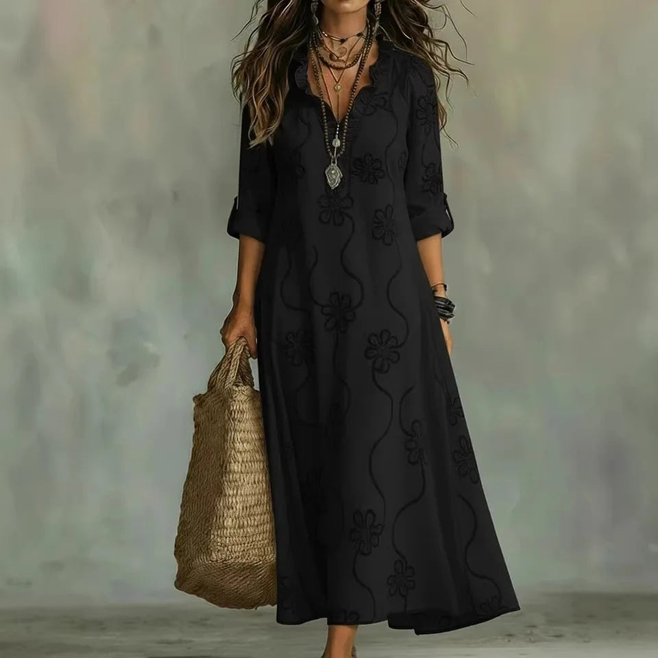Women's floral maxi dress with V-neckline and three-quarter sleeves