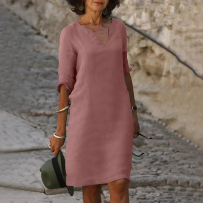 Women's straight mini dress with V-neckline and three-quarter sleeves