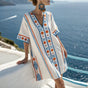Women's white mini dress with blue and orange geometric patterned trims
