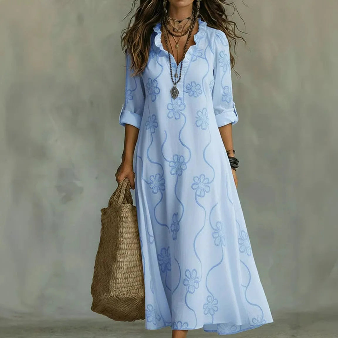 Women's floral maxi dress with V-neckline and three-quarter sleeves
