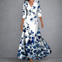 Women's floral wrap maxi dress with V-neckline and three-quarter sleeves