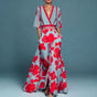 Women's blue and red floral wrap maxi dress with V-neckline and three-quarter sleeves