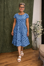 Women's abstract patterned knee-length dress with round neck and short sleeves