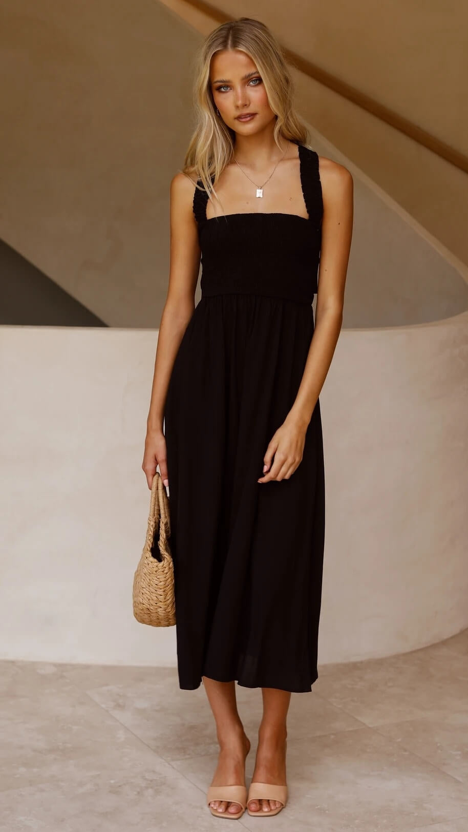 Women's sleeveless square-neck maxi dress with smocked bodice and gathered skirt