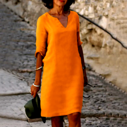 Women's straight mini dress with V-neckline and three-quarter sleeves