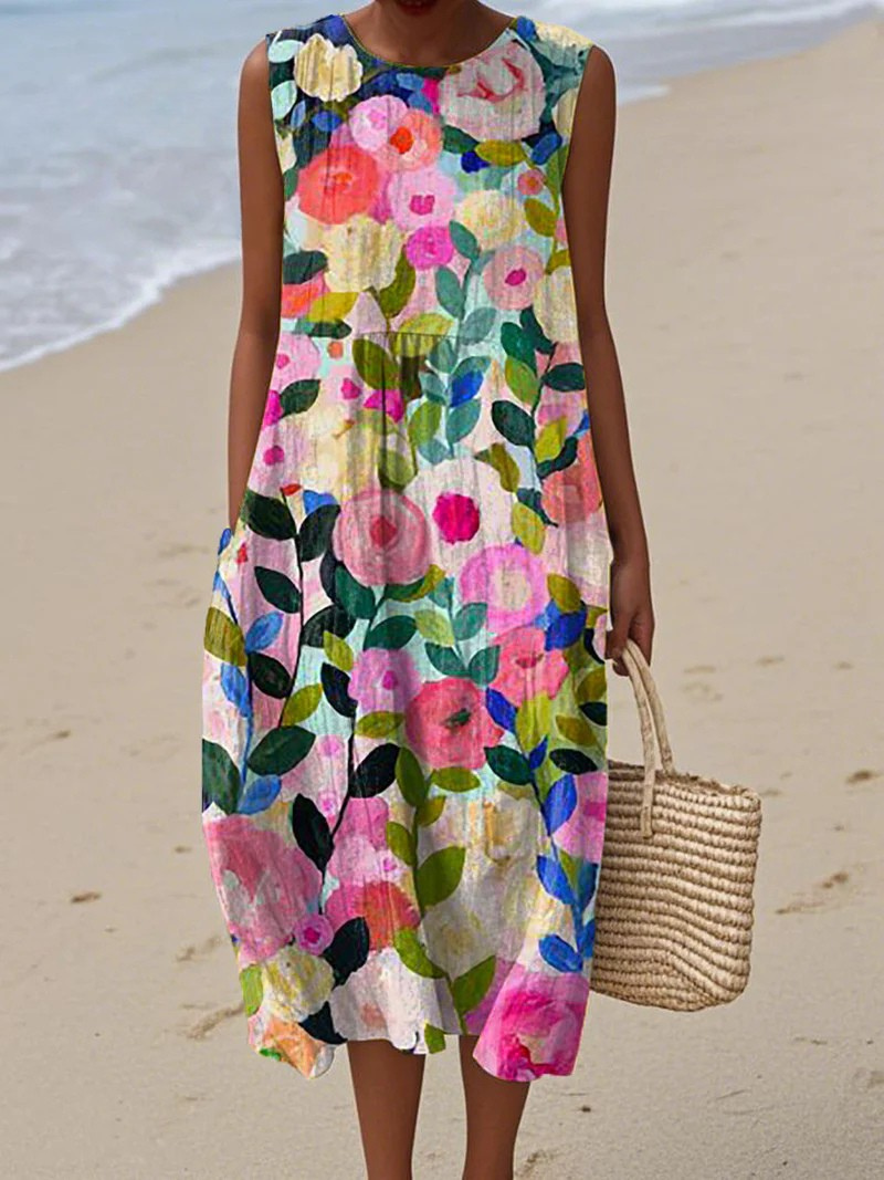 Women's sleeveless floral midi dress with a round neckline and relaxed fit