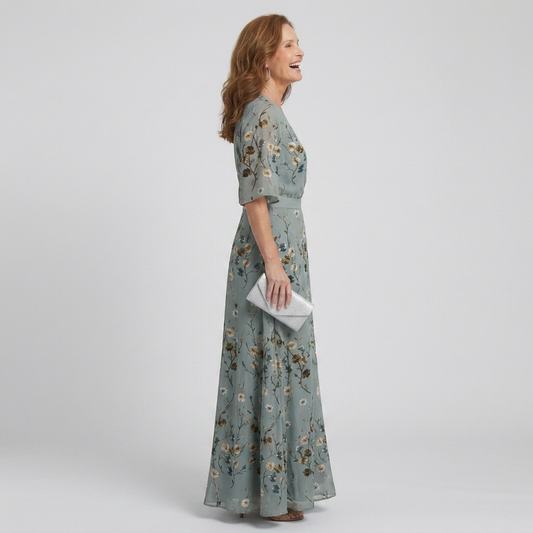 Women's green floral wrap maxi dress with V-neckline and elbow-length sleeves