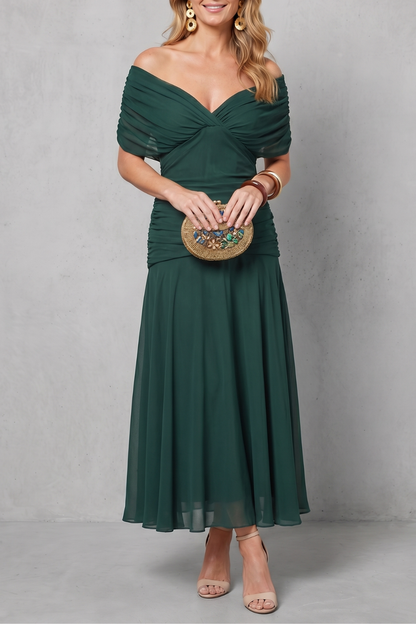 Women's floral wrap maxi dress with draped off-shoulder bodice and flowing ankle-length skirt