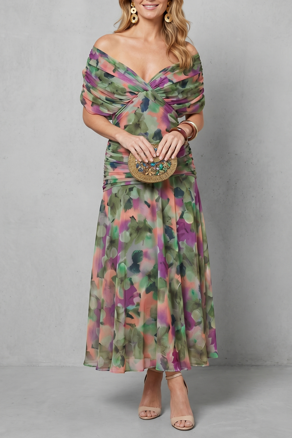 Women's floral wrap maxi dress with draped off-shoulder bodice and flowing ankle-length skirt