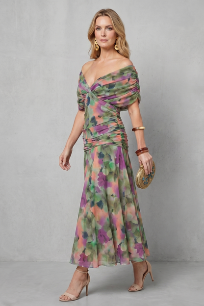 Women's floral wrap maxi dress with draped off-shoulder bodice and flowing ankle-length skirt