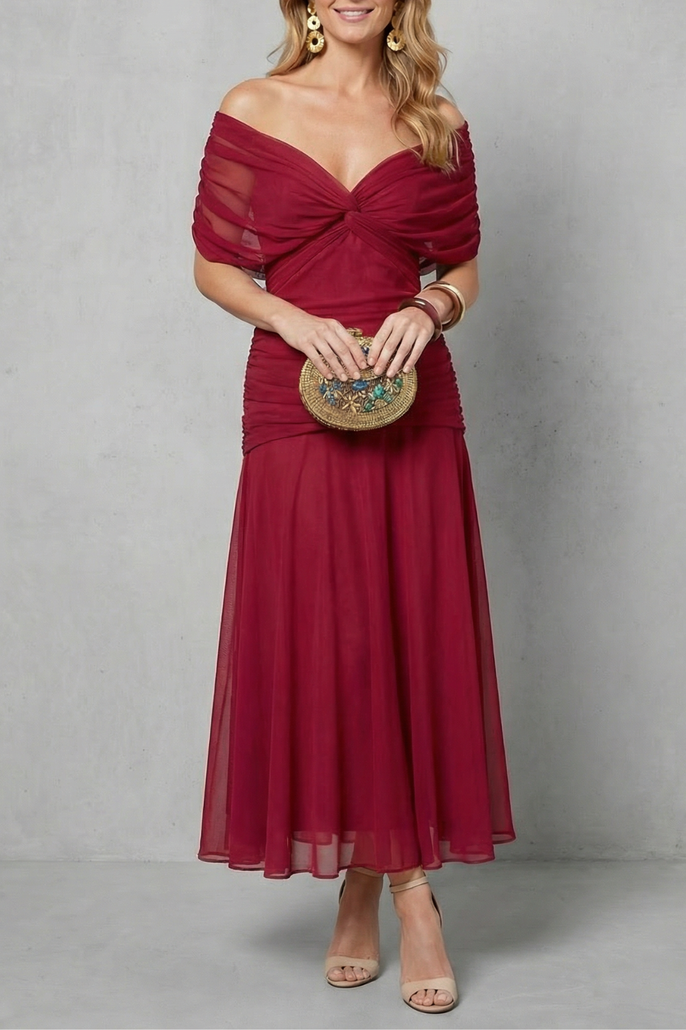 Women's floral wrap maxi dress with draped off-shoulder bodice and flowing ankle-length skirt