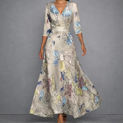 Women's floral wrap maxi dress with V-neckline and three-quarter sleeves