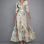 Women's floral wrap maxi dress with V-neckline and three-quarter sleeves