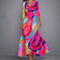 Women's floral wrap maxi dress with V-neckline and three-quarter sleeves