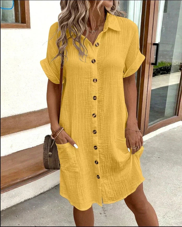 Women's short sleeve shirt dress with button front and patch pockets