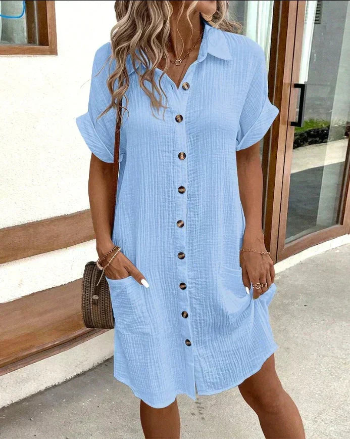 Women's short sleeve shirt dress with button front and patch pockets