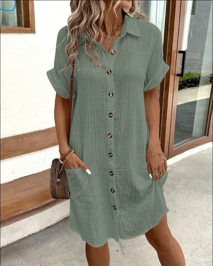 Women's short sleeve shirt dress with button front and patch pockets