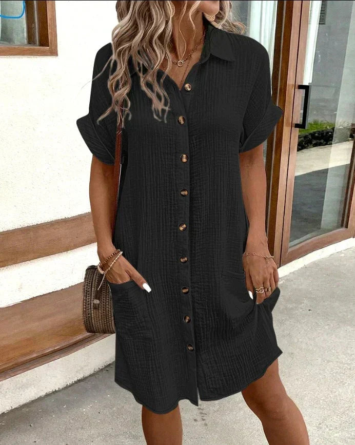 Women's short sleeve shirt dress with button front and patch pockets