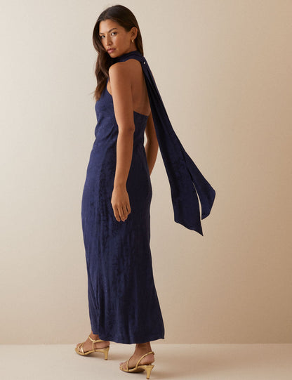 Women's navy floral sleeveless maxi dress with gathered mock neck and back ties