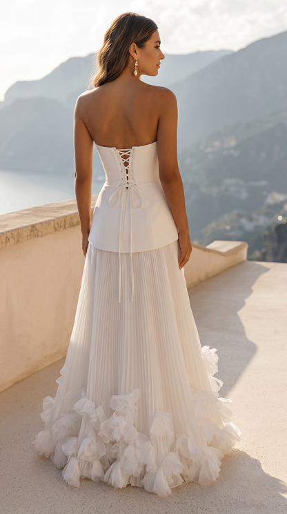 Women's strapless pleated maxi dress with floral appliqué hem