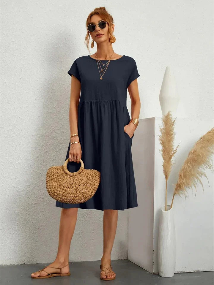 Women's plain gathered midi dress with cap sleeves and side pockets
