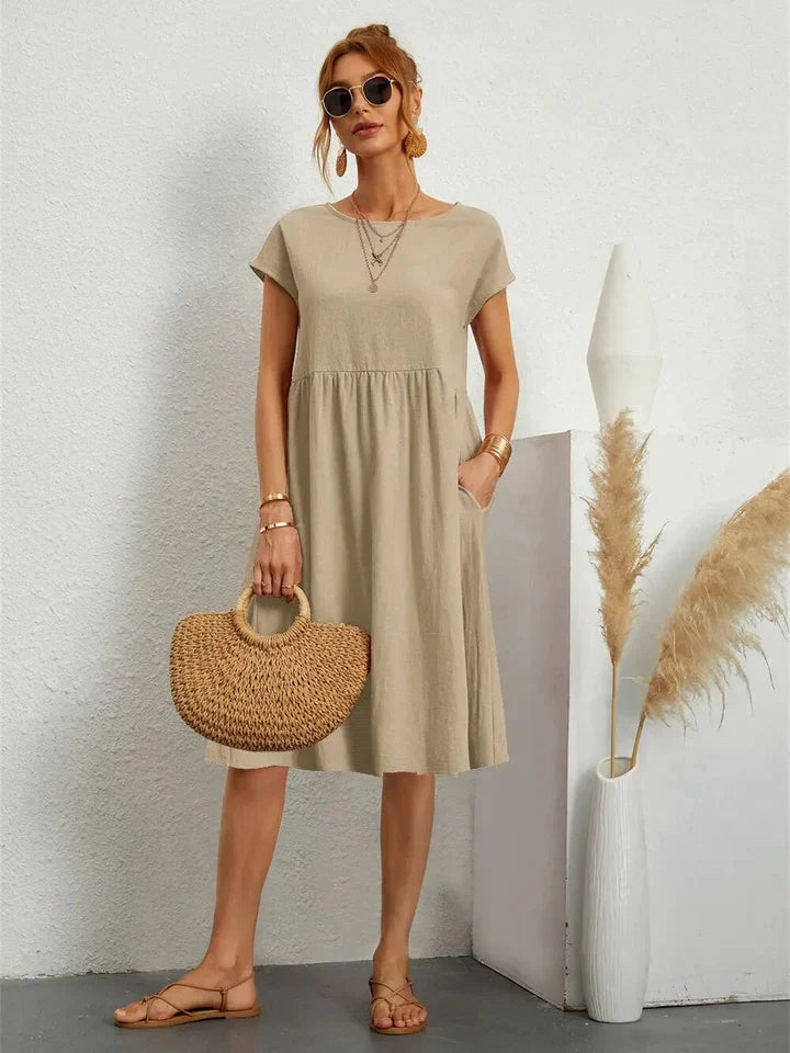 Women's plain gathered midi dress with cap sleeves and side pockets