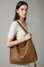Women's large plain shoulder bag with long handles and spacious interior