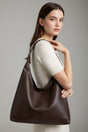 Women's large plain shoulder bag with long handles and spacious interior