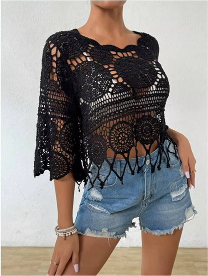 Women's open crochet lace cover-up top with 3/4 sleeves and fringed hem