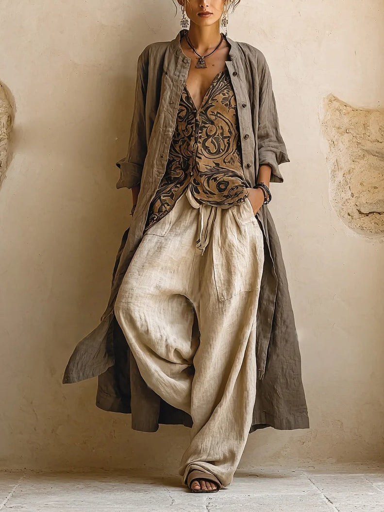 Women's camel three-piece outfit with long coat, patterned V-neck top and wide-leg trousers