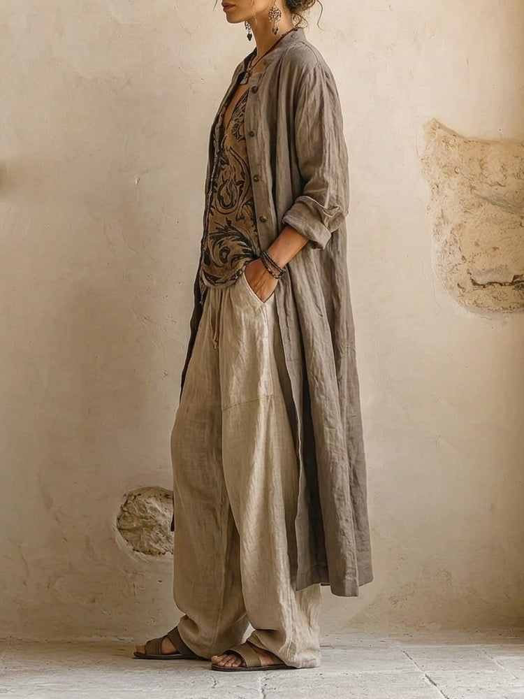 Women's camel three-piece outfit with long coat, patterned V-neck top and wide-leg trousers