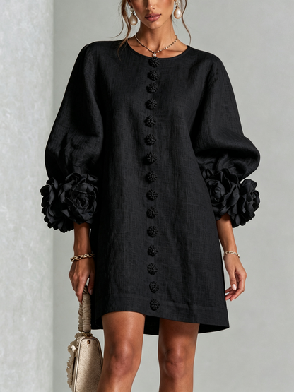 Women's round-neck mini dress with long sleeves, front buttons and oversized floral cuffs