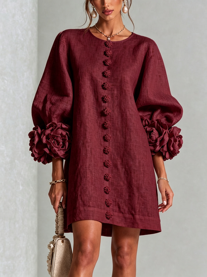 Women's round-neck mini dress with long sleeves, front buttons and oversized floral cuffs