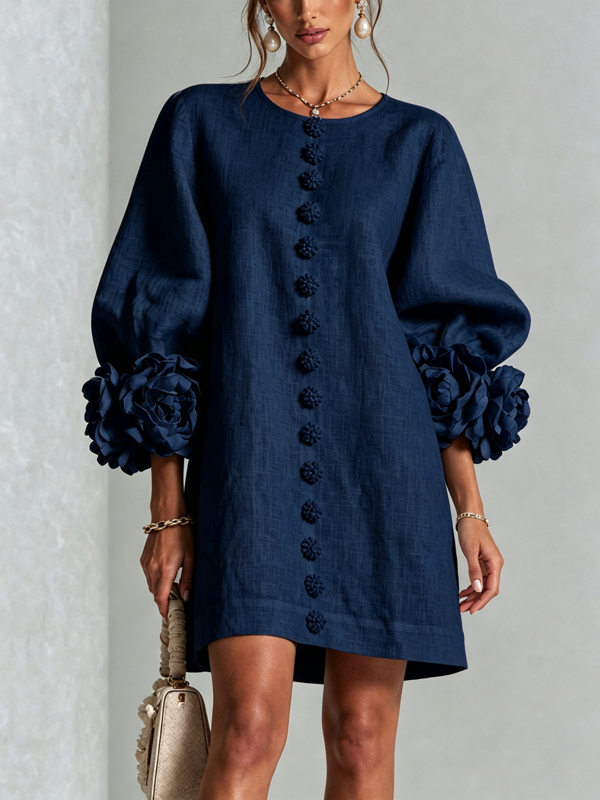 Women's round-neck mini dress with long sleeves, front buttons and oversized floral cuffs