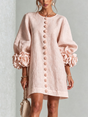 Women's pink mini dress with long sleeves, front buttons and large flower cuffs