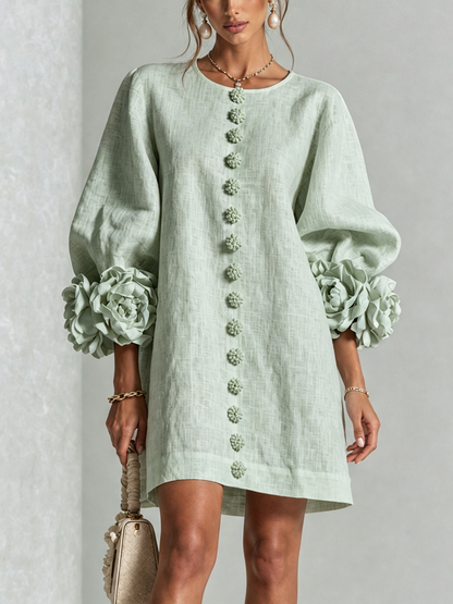 Women's round-neck mini dress with long sleeves, front buttons and oversized floral cuffs